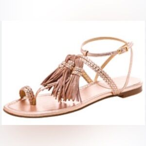 Stuart Weitzman Tassel Flat sandal.